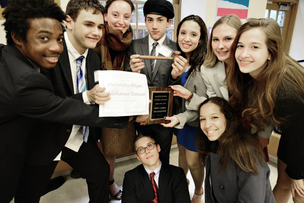 The Brooklyn Friends Delegation at DMUNC II in 2014. From left to right to bottom right to bottom left: Miles Nabritt, Isaac Handy with Outstanding Delegate award, Eve Bromberg, Emmitt Sklar with Best Delegate gavel award , Julia Cohen, Grace Morenko, Anna Franceschelli, Ruby Phillips, and Nick Ullman