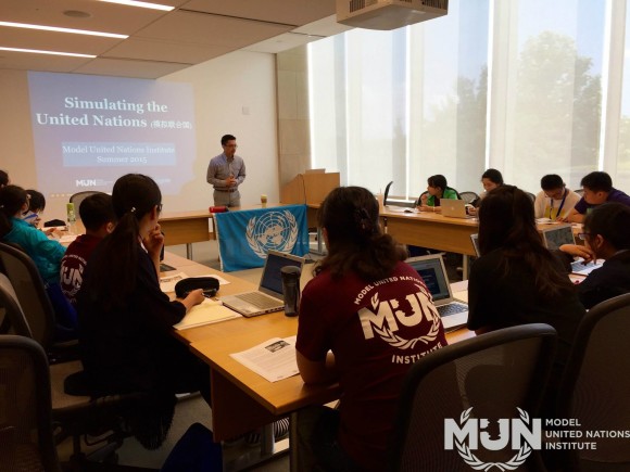 Ryan teaching a group of exchange students from China at the Harvard 2015 iteration of the MUN Institute